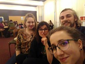 Description: Image may contain: 4 people, people smiling, people sitting, eyeglasses, selfie and indoor